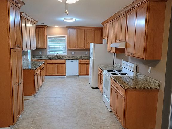 Fully equipped kitchen with lots of cabinet space.