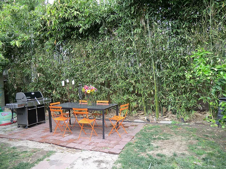 Outdoor dining area.Enclosed private yard.