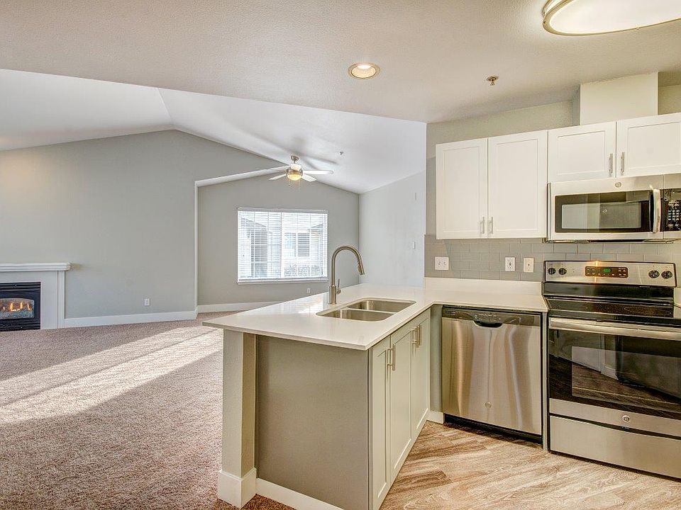 Clock Tower Village Apartment Homes Kitchen and Living Room