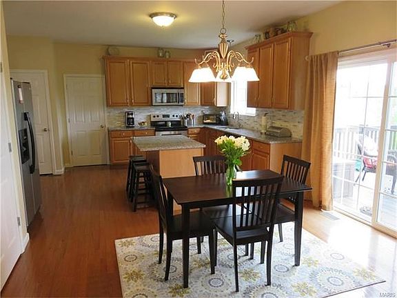 Your guests will be wowed when they walk down the hall and enter this view of the kitchen and breakfast area!