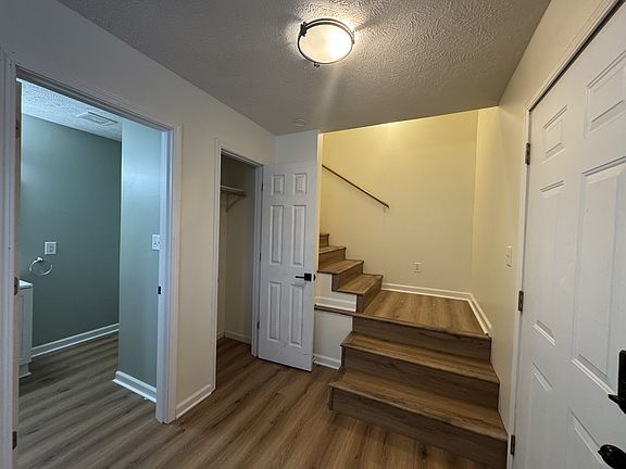 Entry and Stairs. .5 bath and coat closet.