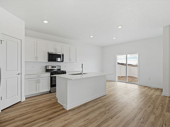 The kitchen has a wonderful kitchen island.
