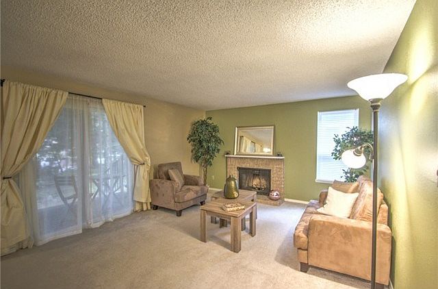 Enjoy your living room with sliding doors leading right to your