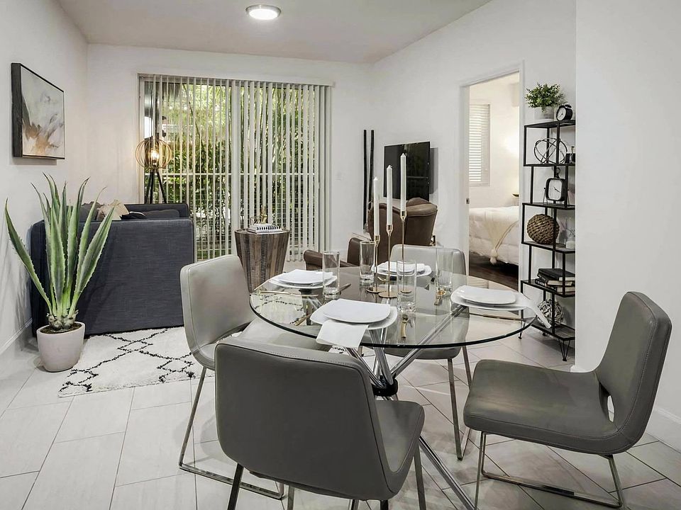 Light-Filled Living Area with Sliding Doors to Private Balcony