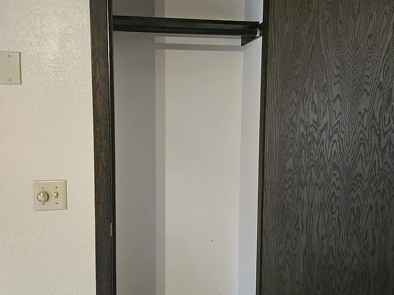 Coat closet off front entryway/ living room