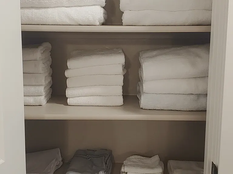 Hall closet for linens.