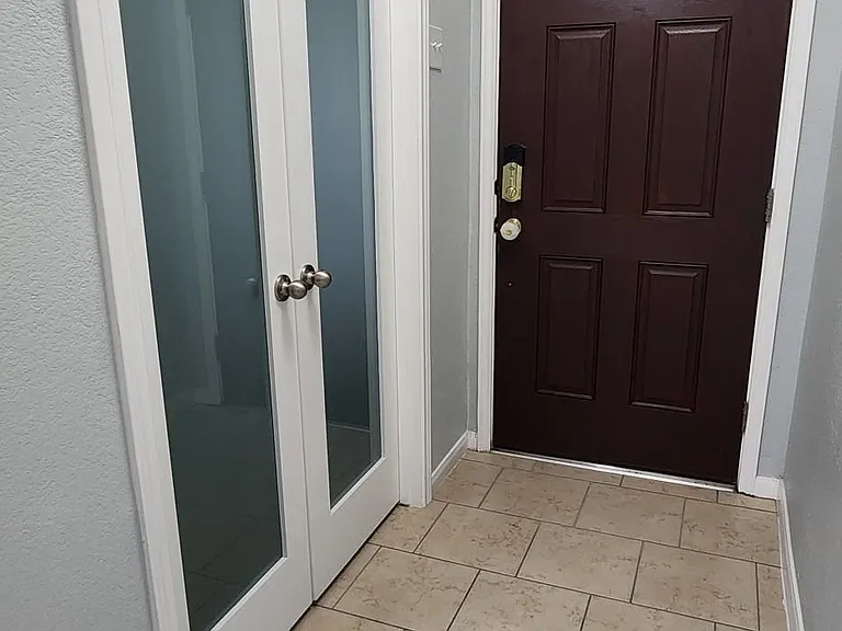 Hallway to front door and office