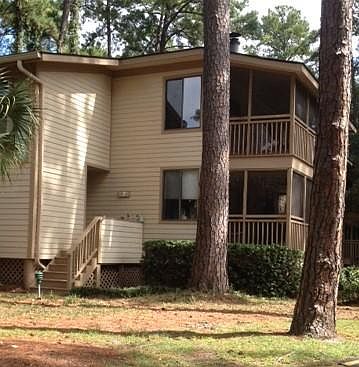 Exterior: Unit is on the first floor and has a large screened porch.