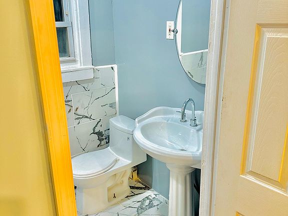 View of bathroom from bedroom area