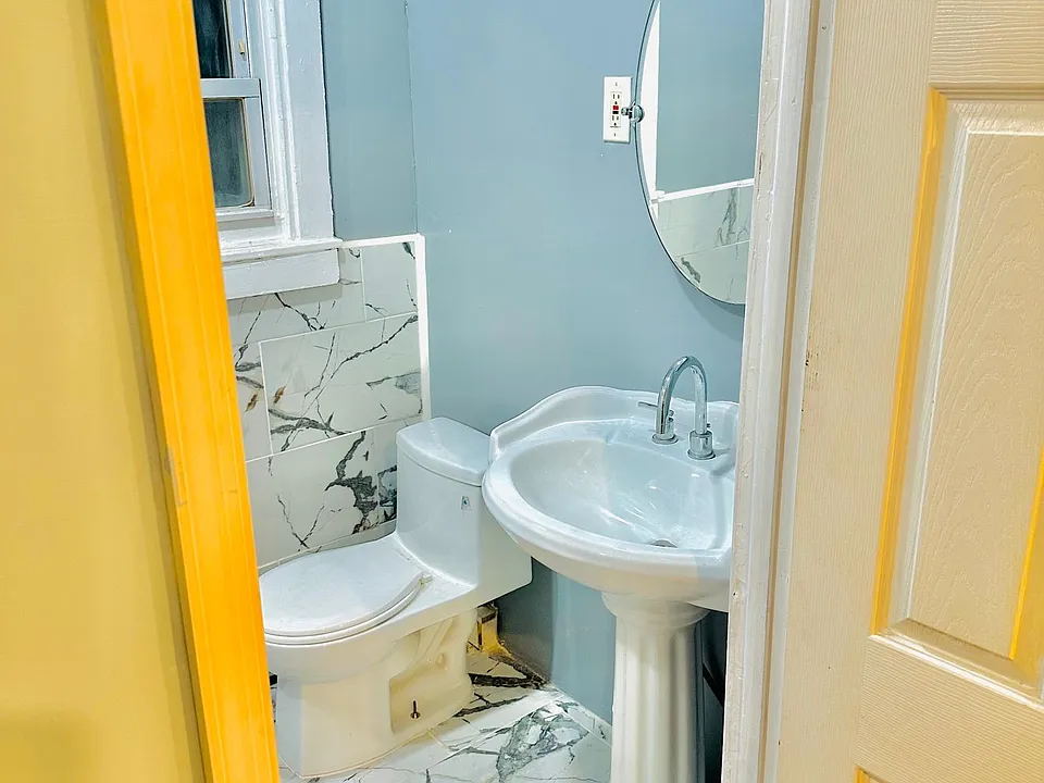 View of bathroom from bedroom area