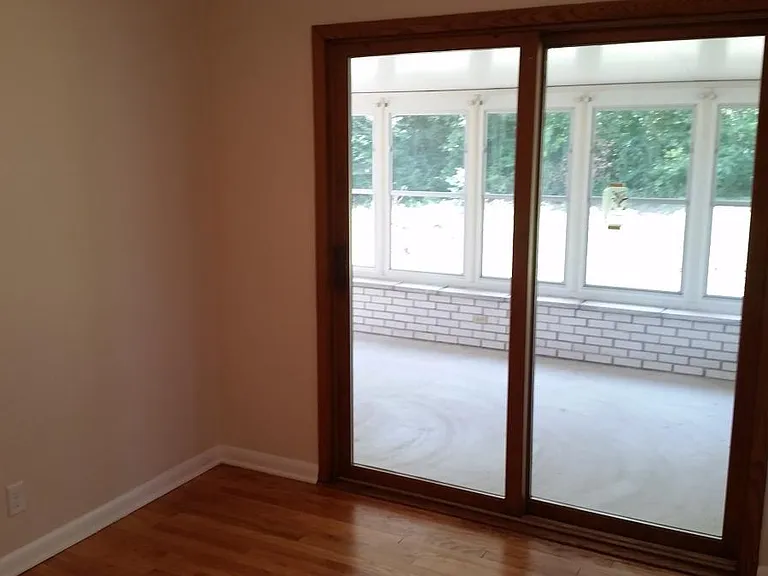 3rd bedroom leads to sunroom