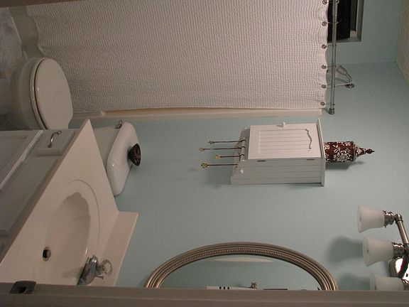 One of two freshly remodeled bathrooms (including tile).