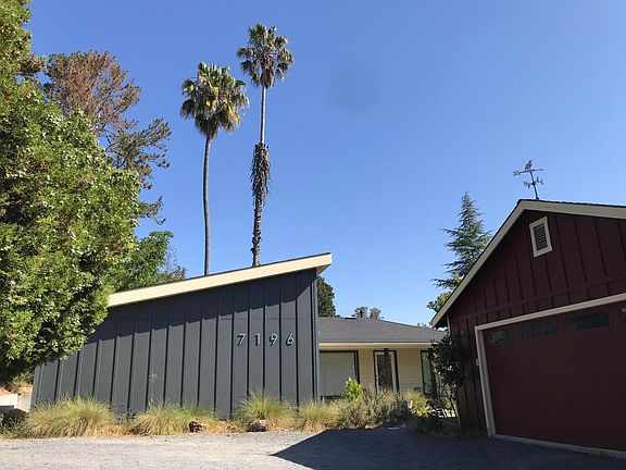 Two car garage and ample parking in driveway.