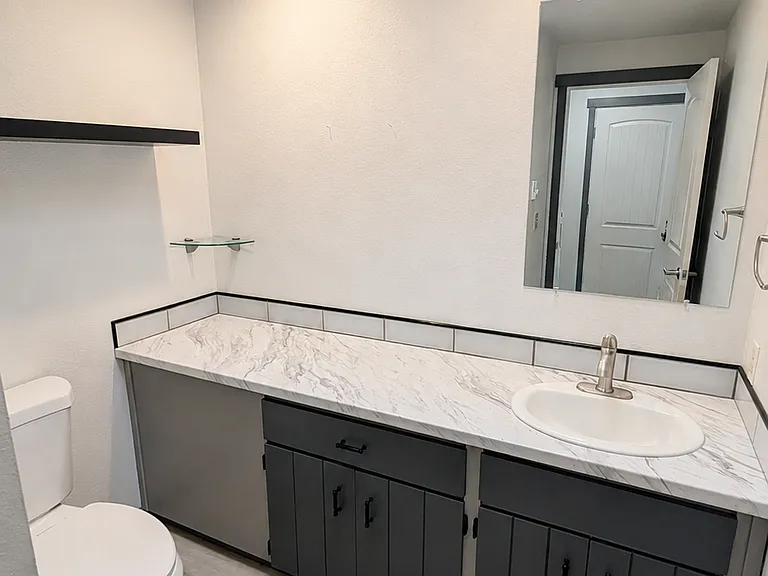 Upstairs bathroom with skylight