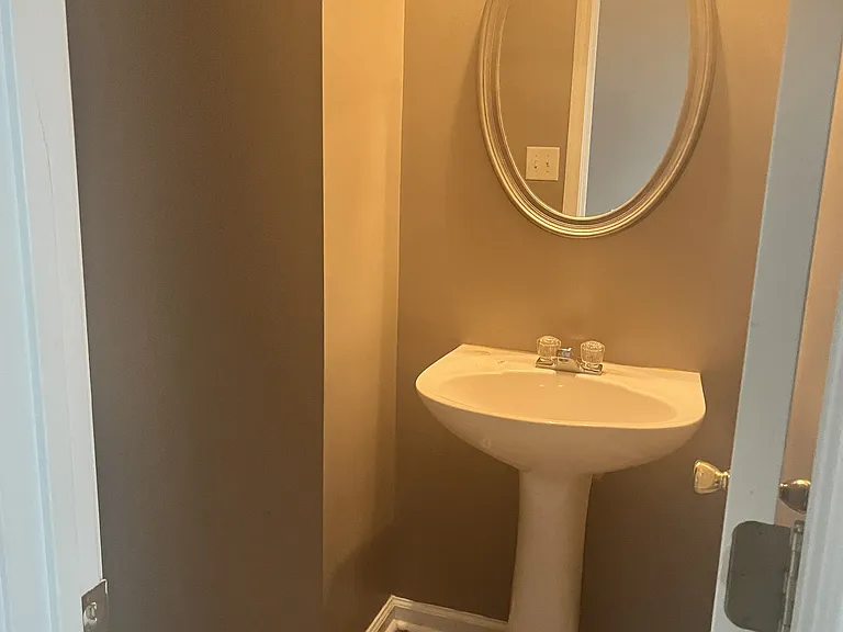 Half bathroom connected to family room