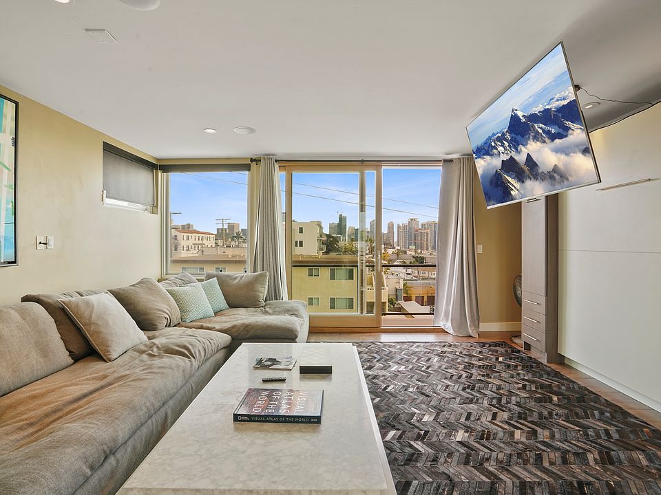 Top Floor Loft Room with Murphy Bed and Restoration Hardware Cloud Couch