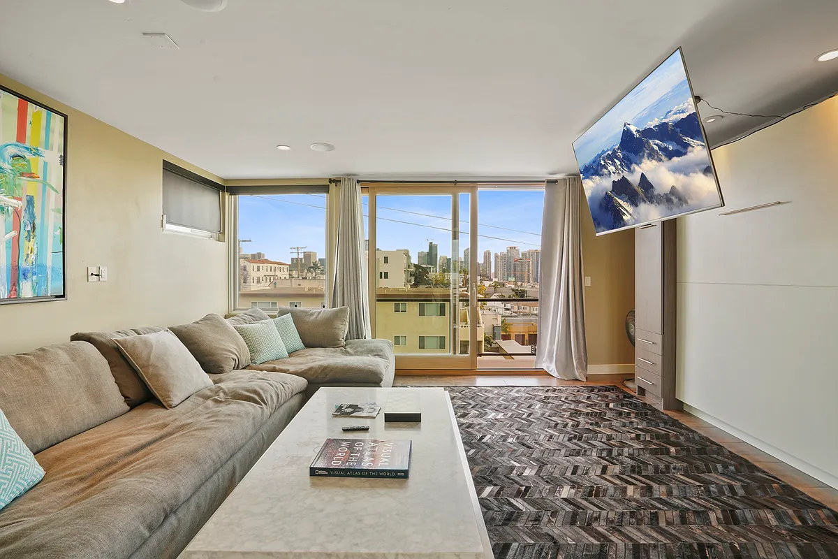 Top Floor Loft Room with Murphy Bed and Restoration Hardware Cloud Couch - 408 W Juniper St W