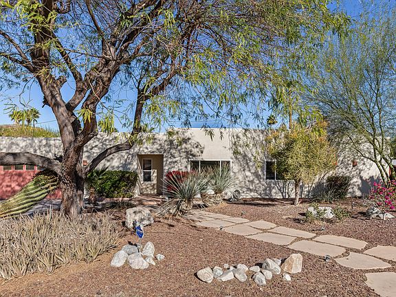 Desert Landscaping with gardener and water paid by owner.