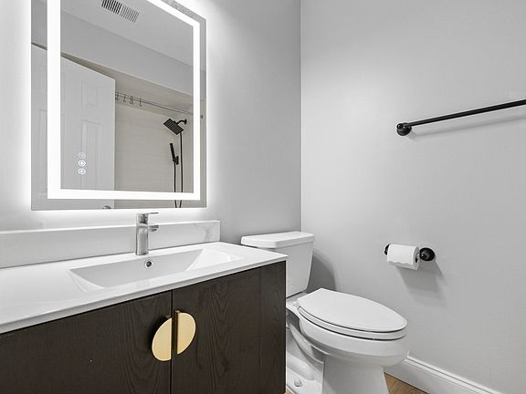 Floating vanity with LED mirror