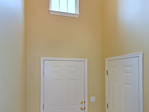 The foyer is double height with lots of natural light