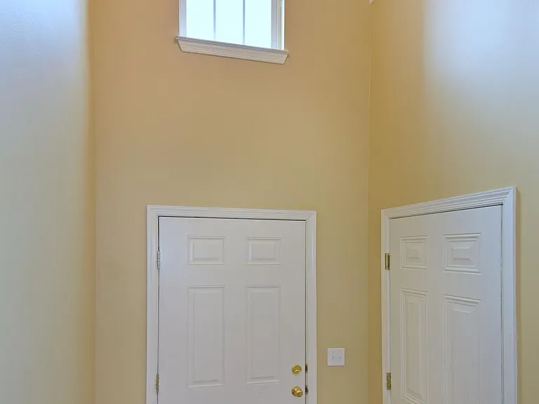 The foyer is double height with lots of natural light
