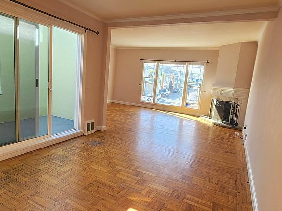 Central Solarium: 12' x 4' next to
Dining room: 10'4" x 14' looking back at Living room: 14' x 19'