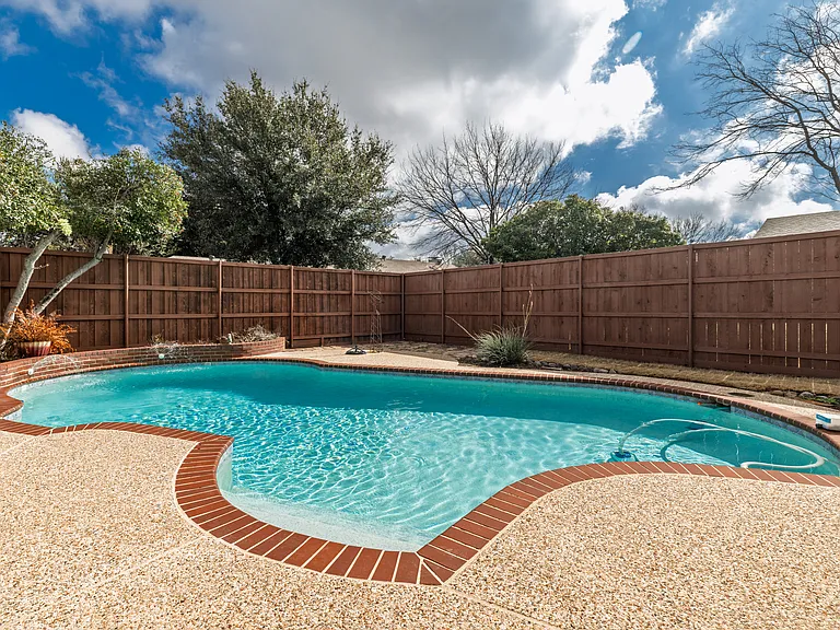 Family friendly swimming pool in private backyard