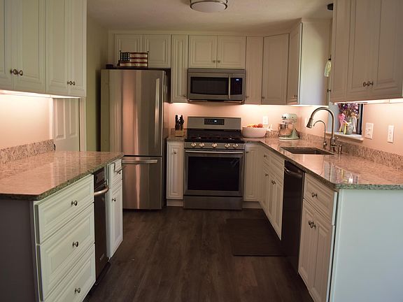 spice rack; soft close cabinets; trash compactor