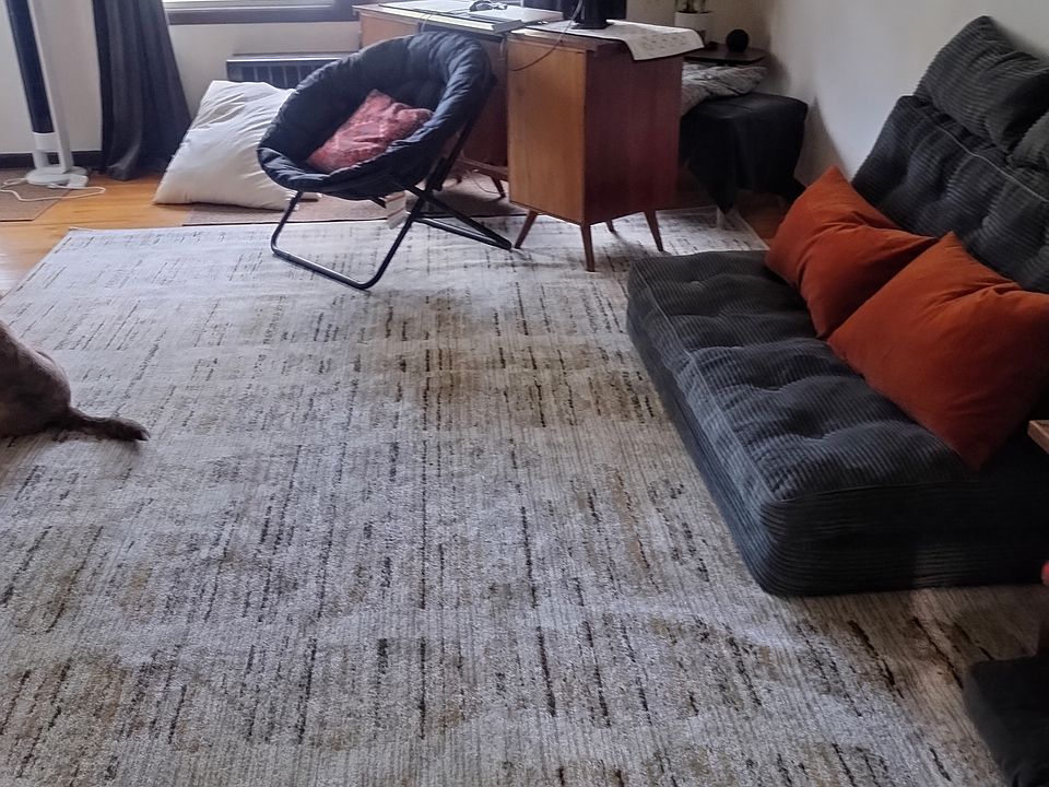 Living room (wood floors, front window)