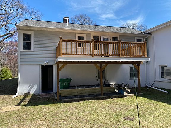 Tenants deck and door to basement.