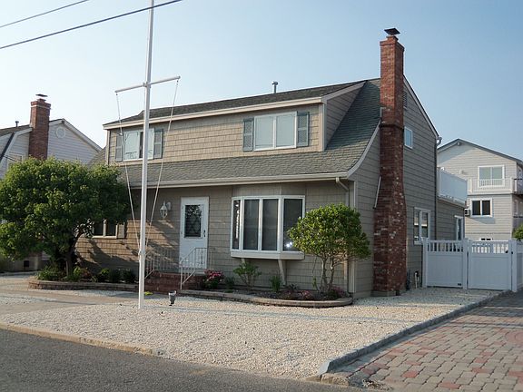 2nd image of 129 E Macevoy Lane  - 121st Street