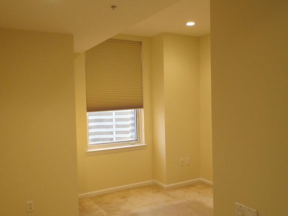 Looking into the bedroom; fits a queen bed