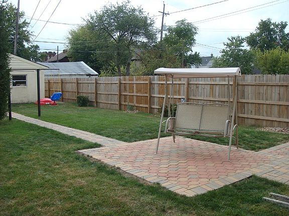 Alternative view of rear yard shows patio