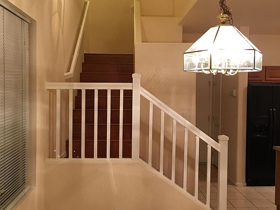 Stairway to 2nd level. 3 bedroom , plus Den.