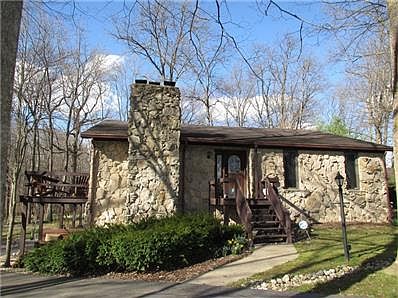 Front Exterior of Home Stone Custom Built 3 Bedroom 2.5 Bathe Ranch with Walk Out Basement