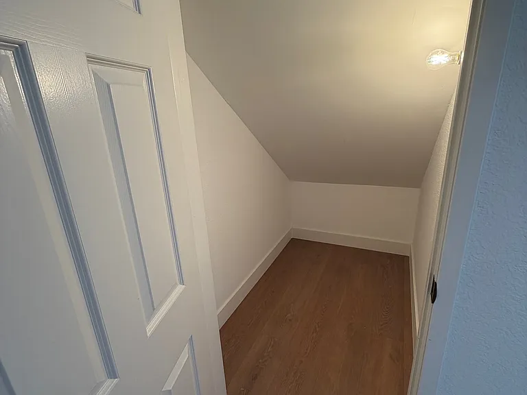 Below stairway storage