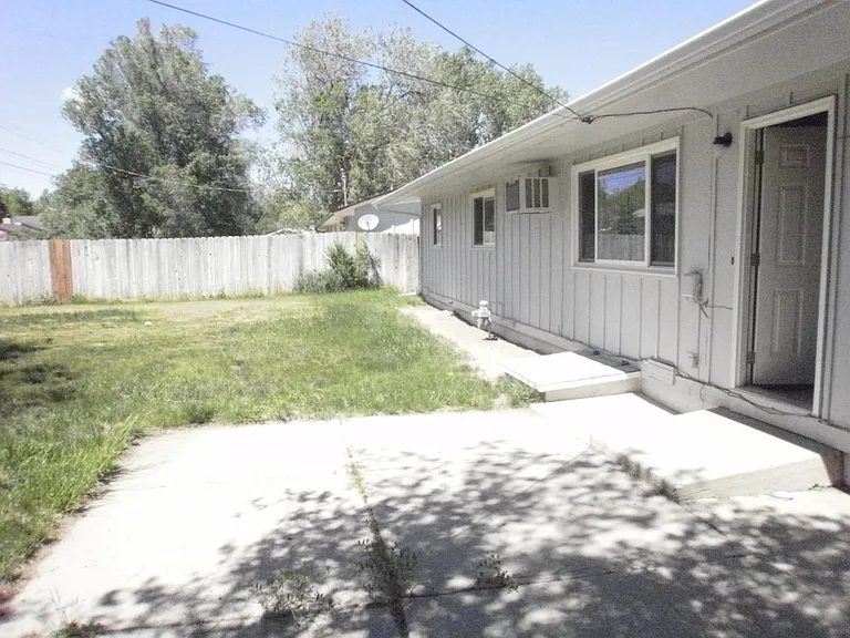 Back yard with six foot privacy fence