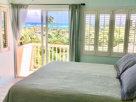 Bedroom with beautiful ocean views and private deck