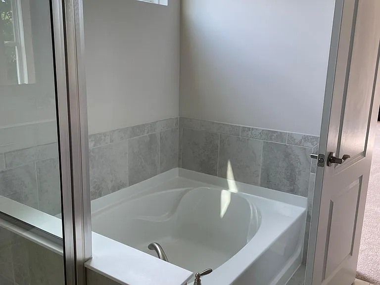 Main bath has shower and tub.