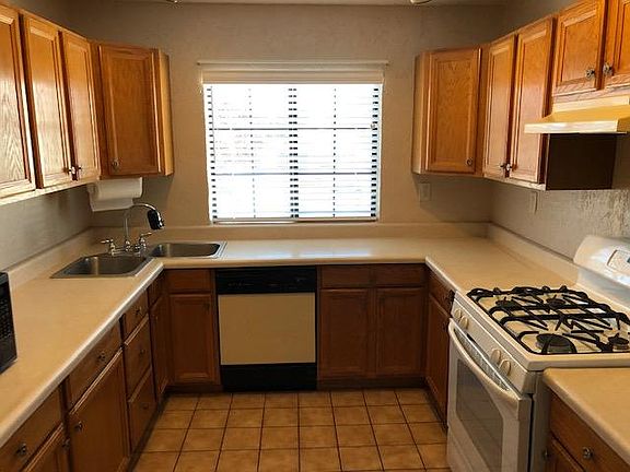 Lots of counter and storage in well-appointed kitchen. Refrigerator included.