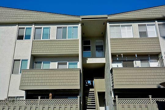 View of condominium complex as you pull into parking area.
