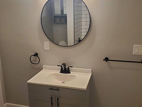 New flooring, cabinets, fixtures throughout