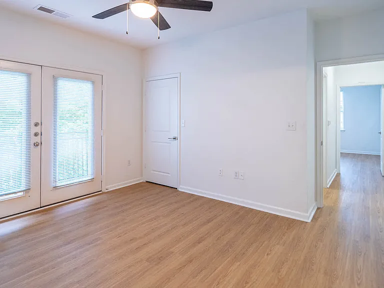 Bedroom with Balcony and Hard Surface Flooring