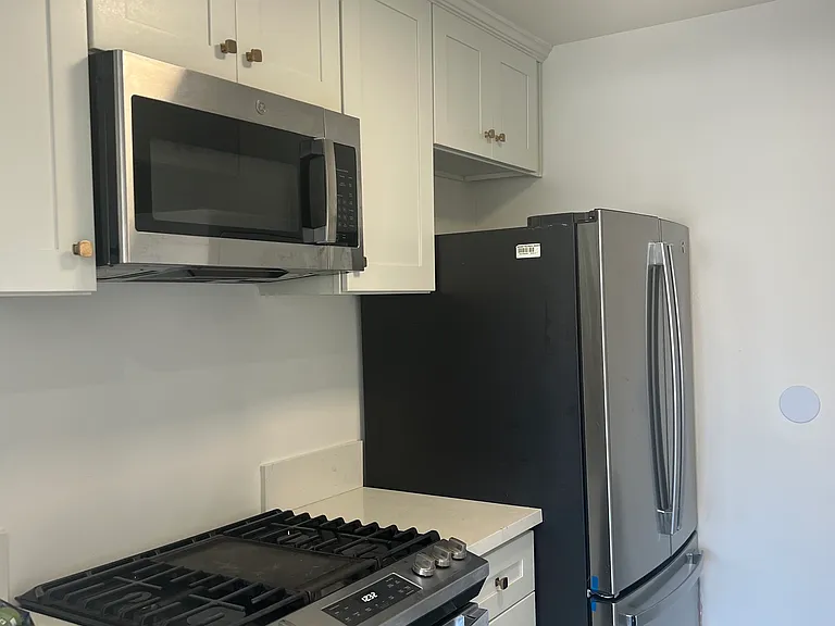 Fully equipped kitchen with stainless steel appliances