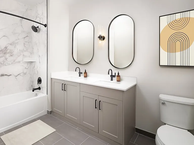 Upgrade Collection bath with quartz countertops and grey cabinetry