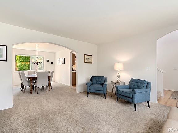 Archway architecture to compliment the formal living and dining rooms.