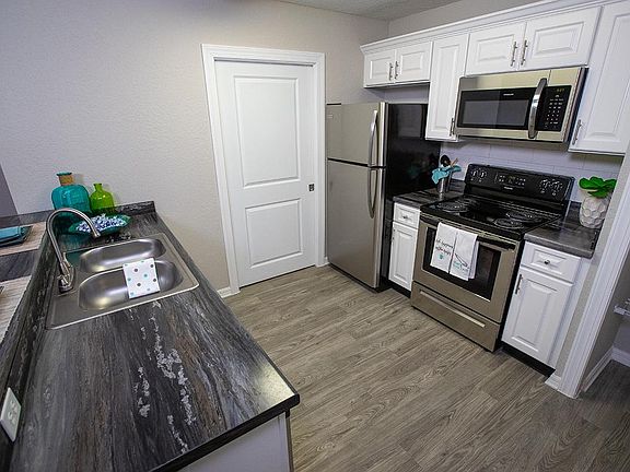 You'll fall in love with your brand new gourmet style kitchen with stainless steel appliances.