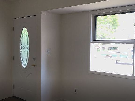 ENTRANCE TO LIVING-ROOM
