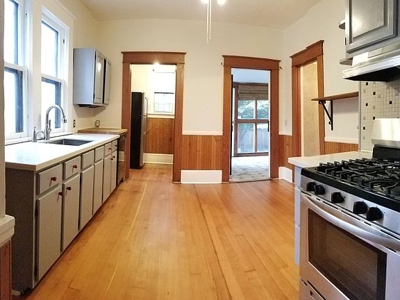 Kitchen looking toward sunroom and pantry