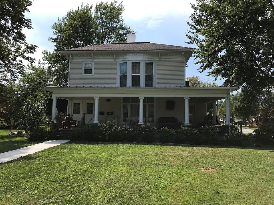 Door on far left has large staircase to upper unit.